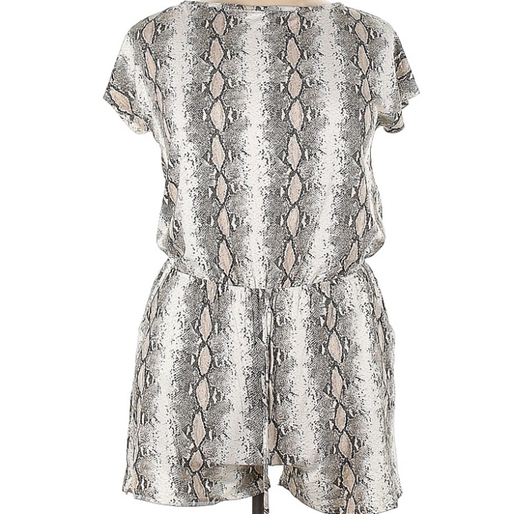 Flamingo Romper
Size L